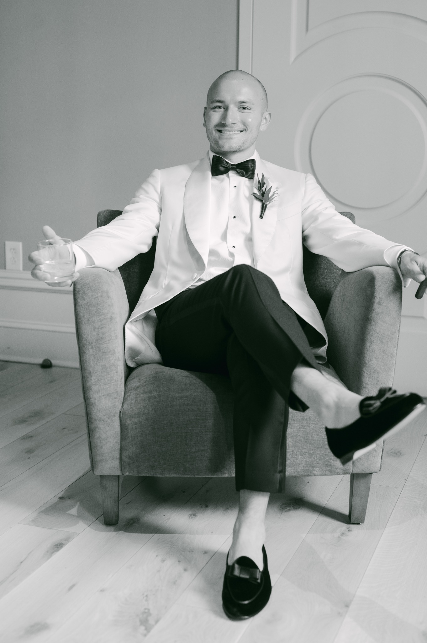 Christian in black tuxedo portrait indoors